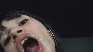 Gloryhole handjob video performed by slender Asian beauty Judas Knight on an unknown cum filled cock featured on HandDomination.
